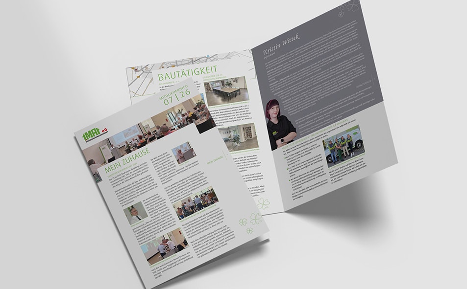 Geöffnete Ausgabe der Mitgliederinfo 07/26 der Wohnungsgenossenschaft „1. Mai“ eG. Die gestalteten Doppelseiten zeigen Texte, Fotos und Informationen rund um das Genossenschaftsleben.